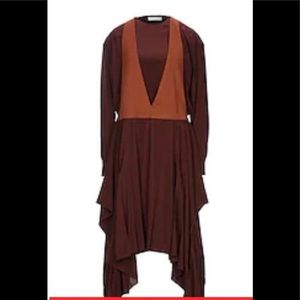 Brand new dress designer Chloe New without tags. Never worn.